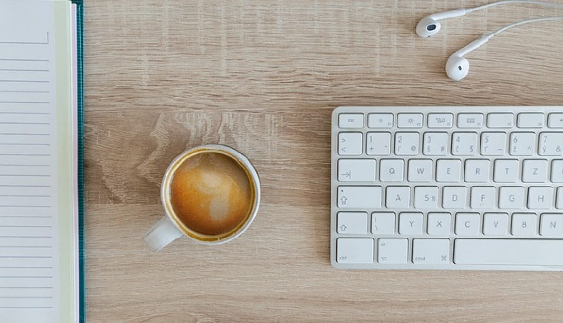 keyboard and coffee cup