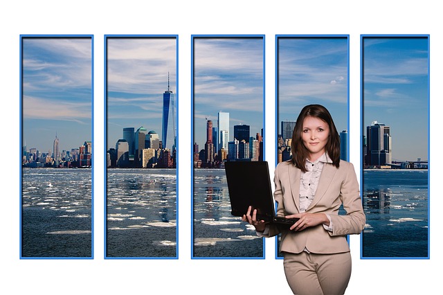 girl holding laptop